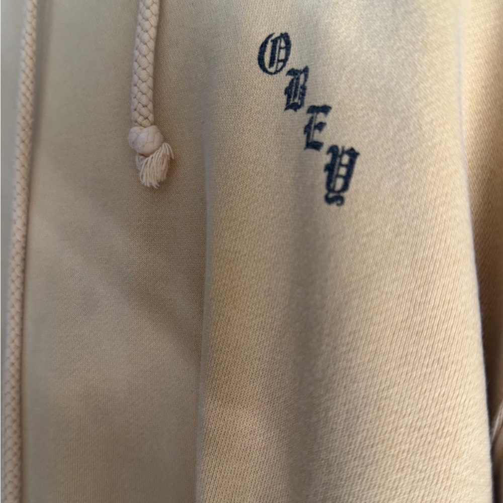 Obey Cream Hoodie with Black Lettering